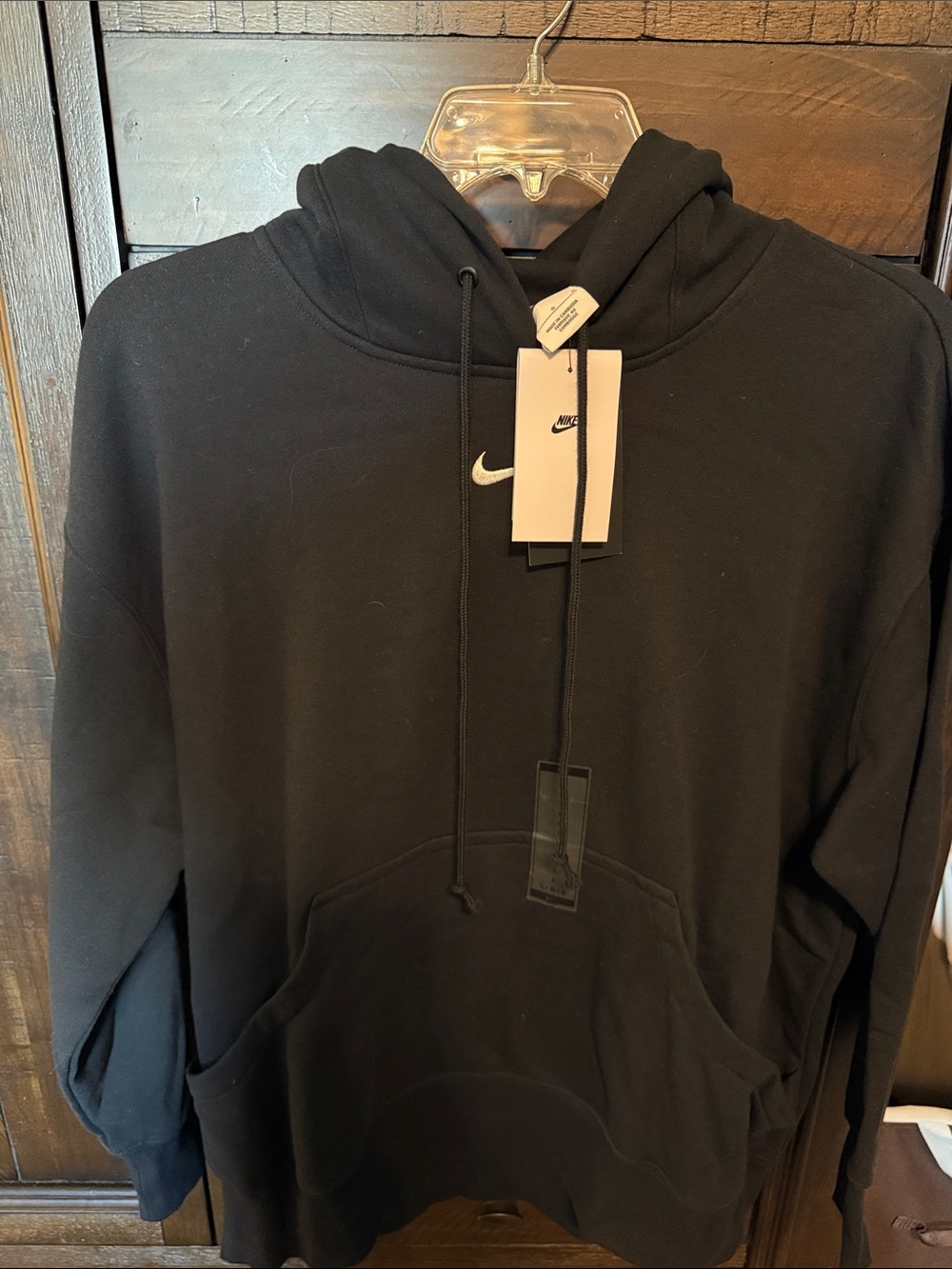 Nike Black Woman’s Pullover Hoodie with White Swoosh